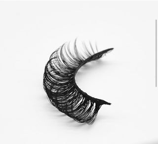 Showing the 90's style against a clean white background to emphasize their dramatic and luxurious look.