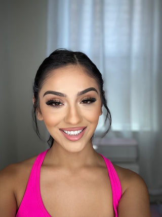 A model wearing the 90's Lashes style to showcase their stunning look.