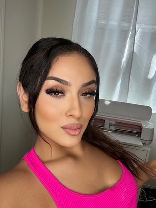 A model wearing the Boss Babe Lashes style to showcase their stunning look.