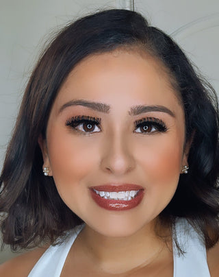 A model wearing the Boss Babe Lashes style to showcase their stunning look.