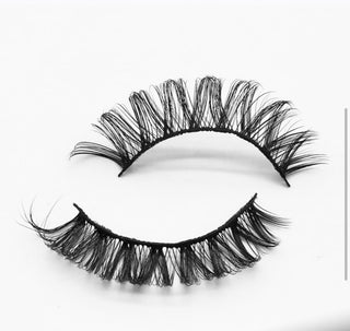 Showing the iconic Lashes style against a clean white background to emphasize their dramatic and luxurious look.
