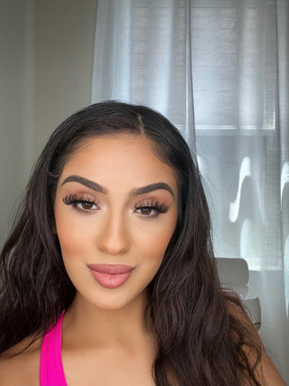 A model wearing the Lashes style to showcase their stunning look.