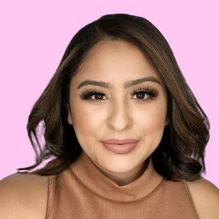 A model wearing the Venus lashes style, showcasing their dramatic yet elegant look. The lashes are full, long, and voluminous, giving a bold, eye-catching effect that enhances the eyes with a fluttery, glamorous finish