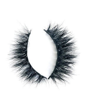 Showing off the so boujee lashes style in a white background